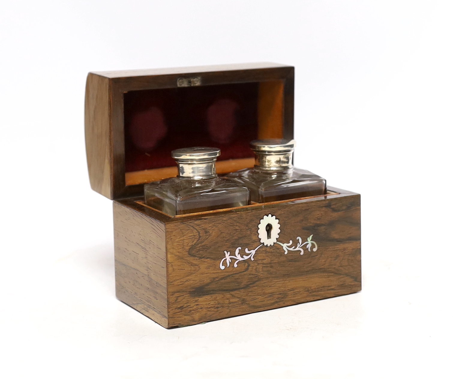 A 19th century mother-of-pearl inlaid rosewood travelling toilet box with two white metal mounted bottles, 14cm wide